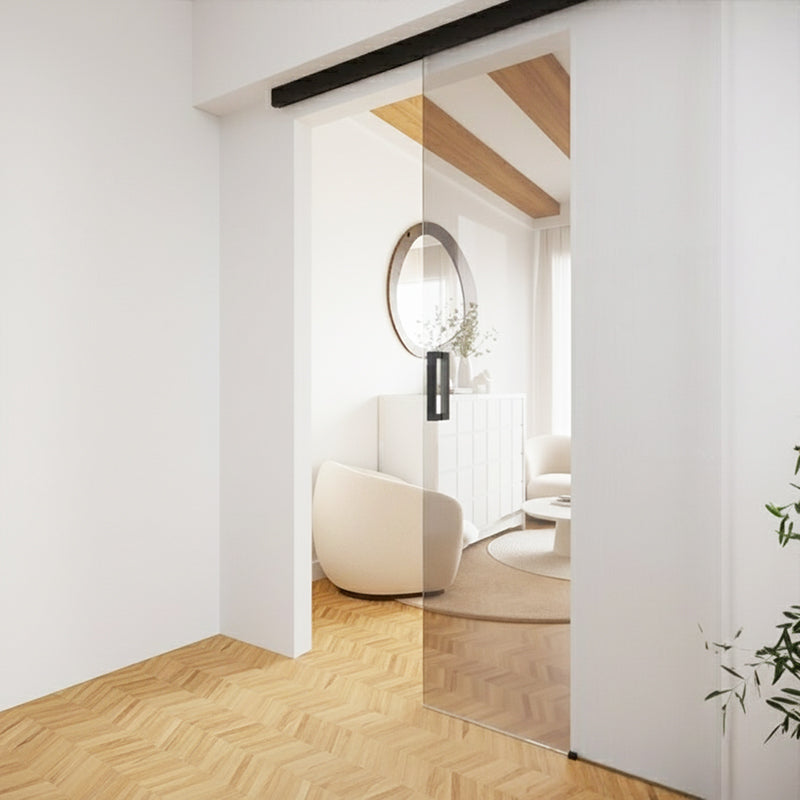 Valo Taivas – kehyksetön lasiliukuovi kattokiinnityksellä